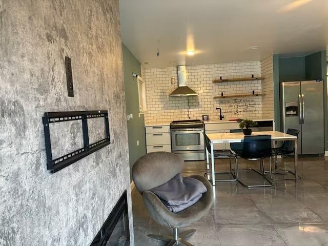5905 S Indiana Ave, Chicago, IL 60637 - kitchen featuring appliances with stainless steel finishes, wall chimney exhaust hood, light countertops, a sink, and open shelves