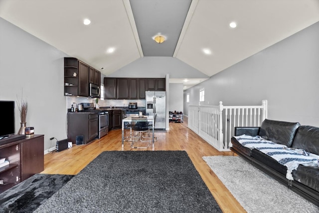 5905 S Indiana Ave, Chicago, IL 60637 - living area with light wood finished floors and vaulted ceiling