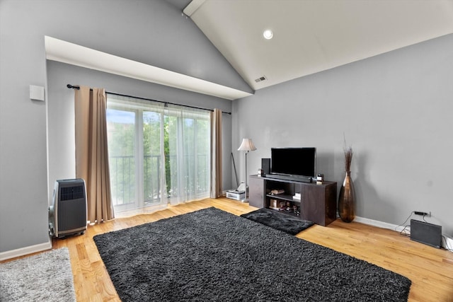 5905 S Indiana Ave, Chicago, IL 60637 - living room featuring wood finished floors, high vaulted ceiling, and baseboards