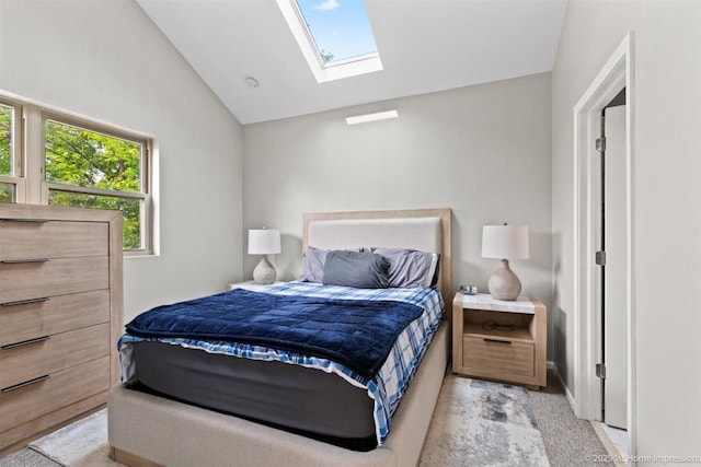 1457 E 71st Pl Unit 3, Chicago, IL 60619 - bedroom with vaulted ceiling, a skylight, and light colored carpet