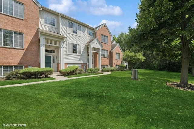 2031 Concord Dr Unit 2031, Mchenry, IL 60050 - view of front of property featuring a front yard and a residential view