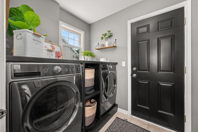 1125 Oxford Cir, Sycamore, IL 60178 - laundry area featuring washer and dryer and tile patterned flooring