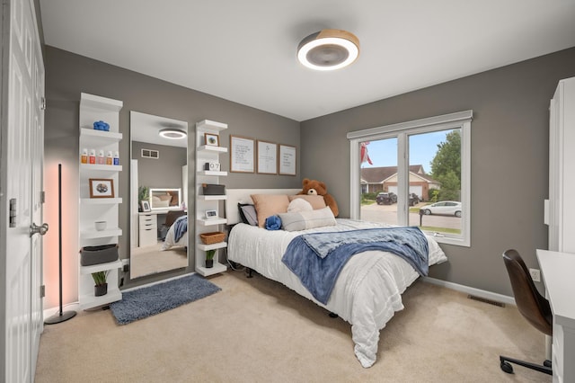 1125 Oxford Cir, Sycamore, IL 60178 - bedroom with light colored carpet and an office area