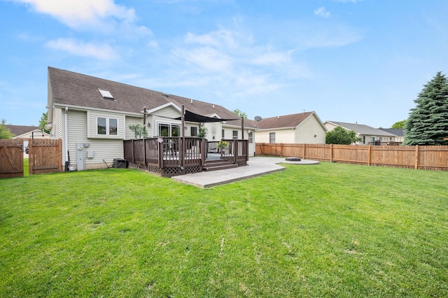 1125 Oxford Cir, Sycamore, IL 60178 - rear view of property with a fenced backyard, a wooden deck, and a patio
