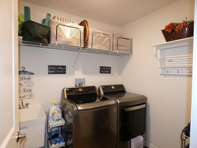 502 Silver Falls St, Joliet, IL 60431 - laundry room featuring separate washer and dryer