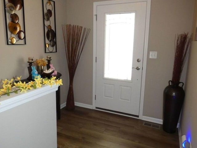 502 Silver Falls St, Joliet, IL 60431 - foyer entrance featuring dark wood-style flooring and baseboards
