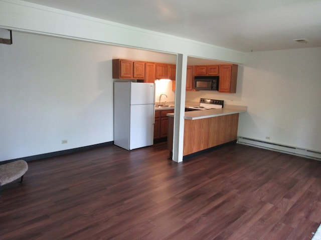 13 Saint Thomas Colony Unit 2, Fox Lake, IL 60020 - kitchen featuring freestanding refrigerator, black microwave, electric range oven, and brown cabinetry