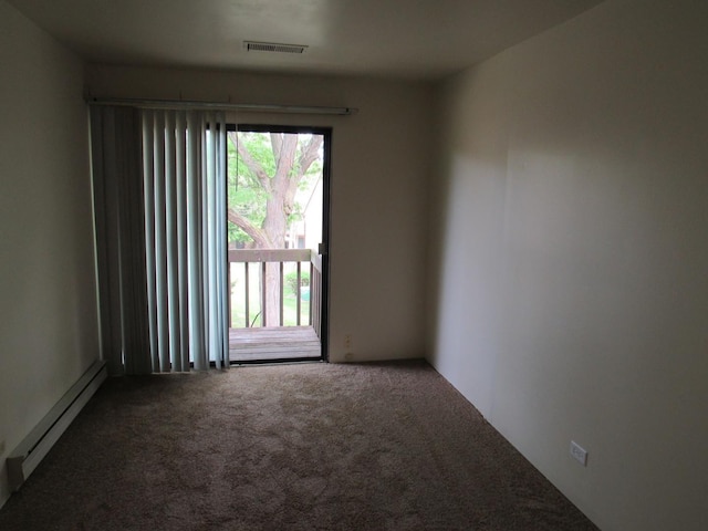 13 Saint Thomas Colony Unit 2, Fox Lake, IL 60020 - carpeted spare room with a baseboard radiator