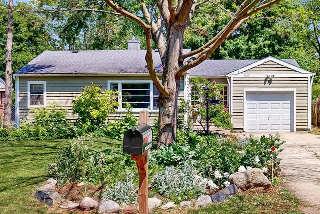 1608 Pleasant Ave, Mchenry, IL 60050 - view of front of property with a chimney, an attached garage, concrete driveway, a front yard, and a shingled roof