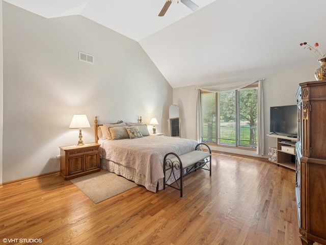 1520 Grant St, Schaumburg, IL 60193 - bedroom with vaulted ceiling, wood finished floors, arched walkways, and ceiling fan