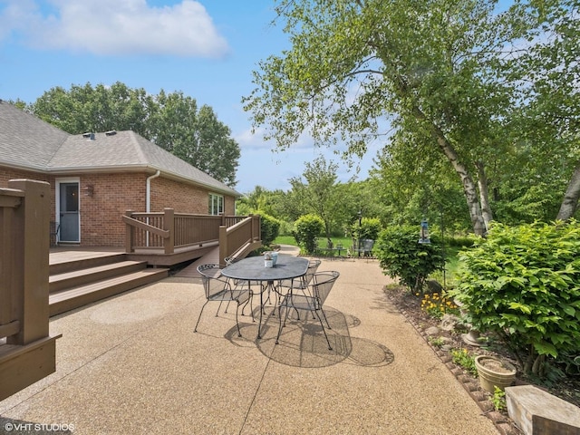 1520 Grant St, Schaumburg, IL 60193 - view of patio featuring a deck and outdoor dining space