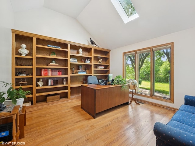 1520 Grant St, Schaumburg, IL 60193 - office area with vaulted ceiling, a skylight, and light wood finished floors