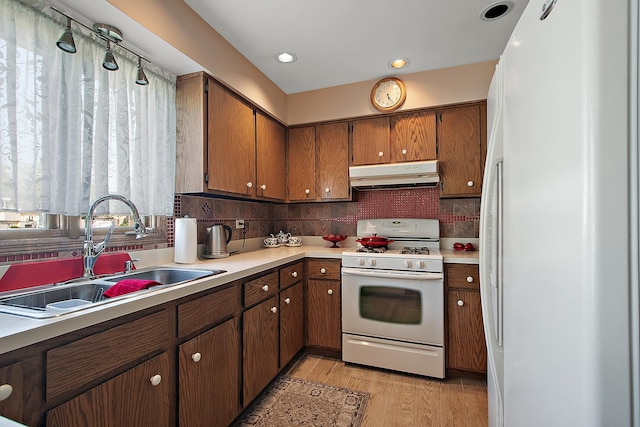 17007 Westwood Ct, Orland Hills, IL 60487 - kitchen featuring white appliances, under cabinet range hood, a sink, tasteful backsplash, and recessed lighting