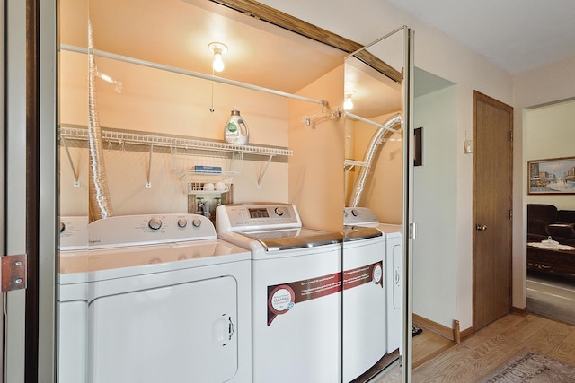 17007 Westwood Ct, Orland Hills, IL 60487 - laundry area featuring washing machine and clothes dryer and light wood-type flooring