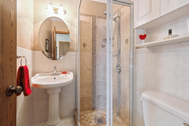 17007 Westwood Ct, Orland Hills, IL 60487 - bathroom with tile walls, a shower stall, and toilet