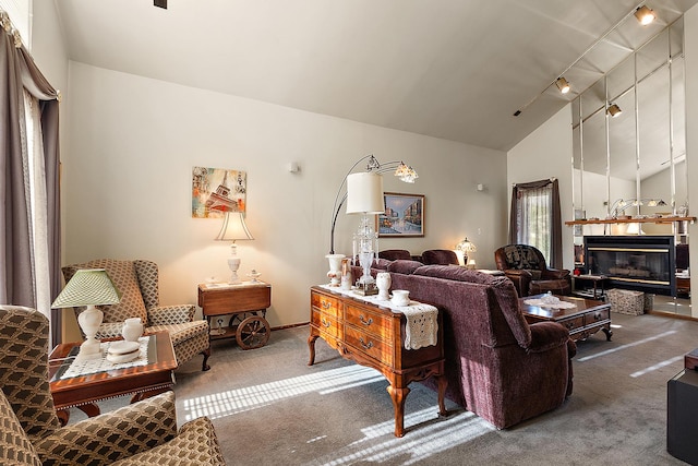 17007 Westwood Ct, Orland Hills, IL 60487 - carpeted living area featuring a glass covered fireplace, high vaulted ceiling, and baseboards