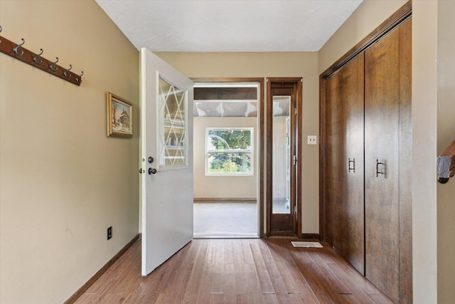 14710 Keslinger Rd, Dekalb, IL 60115 - foyer entrance with wood finished floors and baseboards