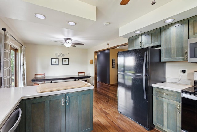 14710 Keslinger Rd, Dekalb, IL 60115 - kitchen featuring stainless steel appliances, ceiling fan, wood finished floors, light countertops, and recessed lighting