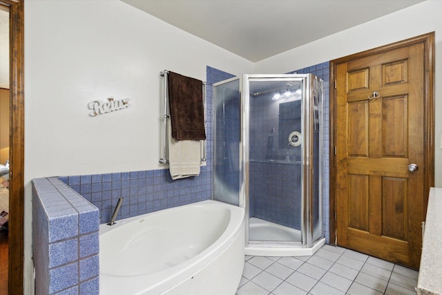 14710 Keslinger Rd, Dekalb, IL 60115 - full bath featuring tile patterned floors, a bath, and a stall shower
