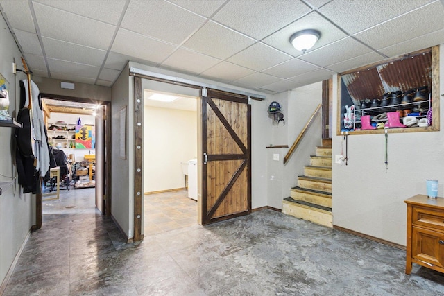 14710 Keslinger Rd, Dekalb, IL 60115 - finished below grade area featuring a barn door, stairs, and a drop ceiling