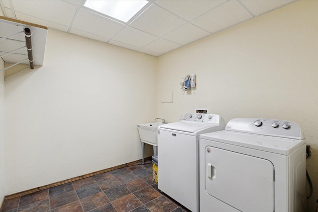 14710 Keslinger Rd, Dekalb, IL 60115 - washroom with independent washer and dryer and dark stone finish floors