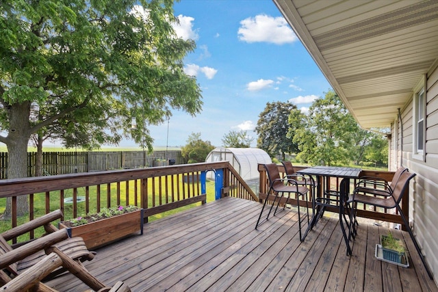 14710 Keslinger Rd, Dekalb, IL 60115 - wooden deck featuring a fenced backyard, a storage shed, and outdoor dining space