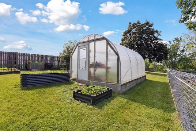 14710 Keslinger Rd, Dekalb, IL 60115 - view of greenhouse featuring a vegetable garden and a fenced backyard
