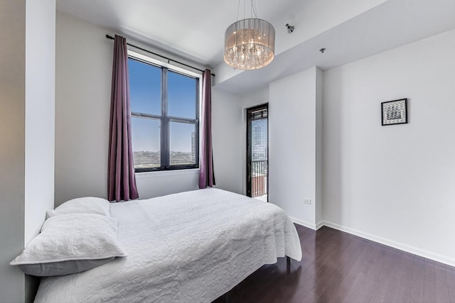 1464 S Michigan Ave Unit 1609, Chicago, IL 60605 - bedroom with dark wood finished floors and a chandelier