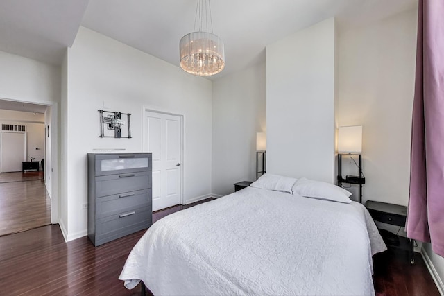 1464 S Michigan Ave Unit 1609, Chicago, IL 60605 - bedroom with dark wood finished floors and a chandelier