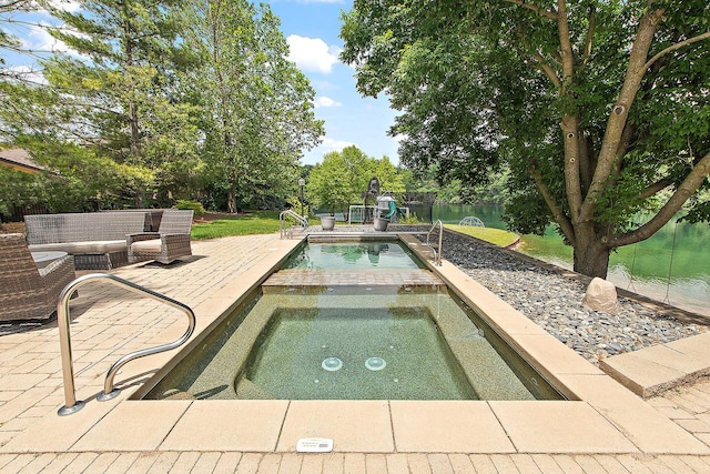 2500 Wahoo Ct, Morris, IL 60450 - view of swimming pool with an in-ground hot tub and a patio
