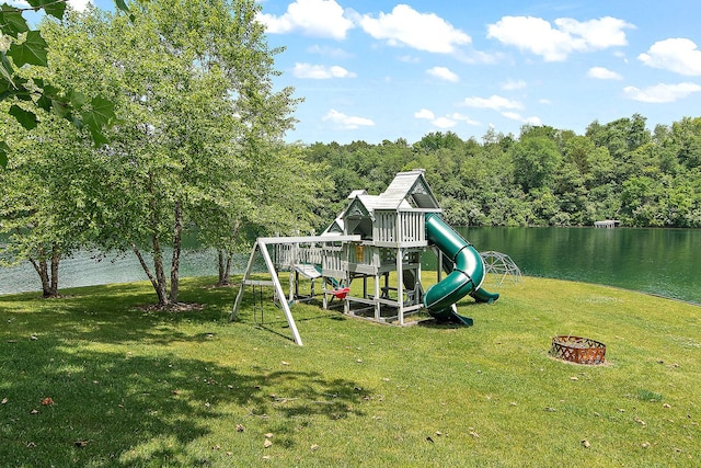 2500 Wahoo Ct, Morris, IL 60450 - view of jungle gym with a yard, a water view, a fire pit, and a wooded view
