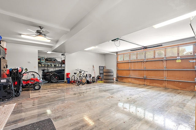 2500 Wahoo Ct, Morris, IL 60450 - garage featuring ceiling fan and a garage door opener