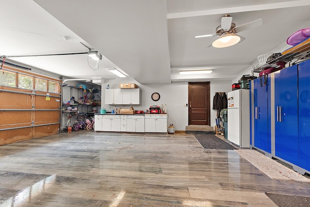 2500 Wahoo Ct, Morris, IL 60450 - garage featuring freestanding refrigerator and ceiling fan