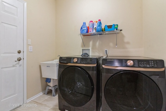 2210 Surrey St, Sycamore, IL 60178 - washroom with washer and clothes dryer and baseboards