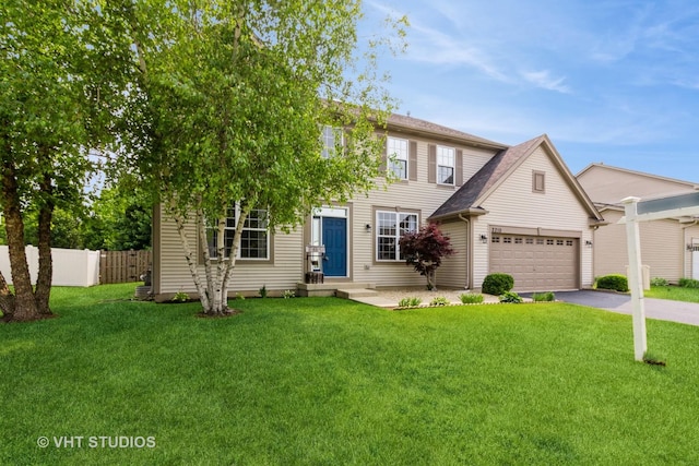 2210 Surrey St, Sycamore, IL 60178 - view of front of house with driveway and a garage