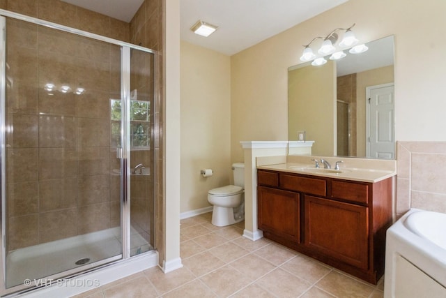 2210 Surrey St, Sycamore, IL 60178 - full bathroom with vanity, tile patterned flooring, and a shower stall