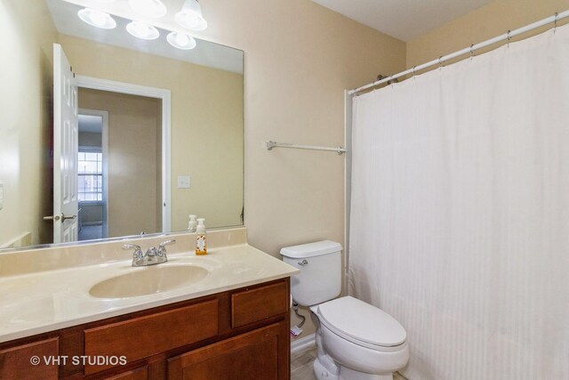 2210 Surrey St, Sycamore, IL 60178 - full bath featuring vanity and a shower with shower curtain