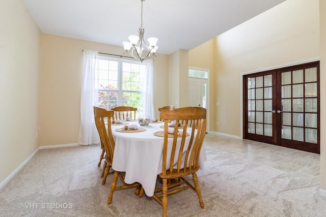 2210 Surrey St, Sycamore, IL 60178 - carpeted dining area with a chandelier and french doors