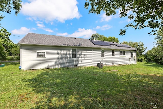 27405 N Roberts Ln, Island Lake, IL 60042 - back of house featuring roof mounted solar panels and a yard