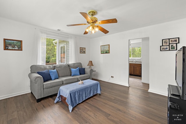 27405 N Roberts Ln, Island Lake, IL 60042 - living area with healthy amount of natural light, dark wood finished floors, and a ceiling fan