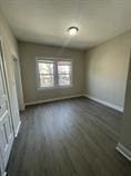 4514 S Honore St, Chicago, IL 60609 - interior space featuring dark wood finished floors and baseboards