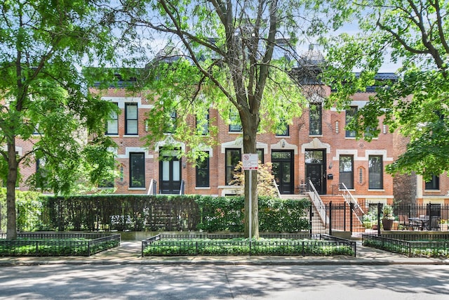 2123 N Bissell St, Chicago, IL 60614 - multi unit property with brick siding and a fenced front yard