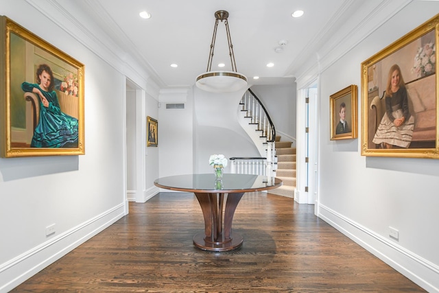 2123 N Bissell St, Chicago, IL 60614 - hallway featuring crown molding, recessed lighting, stairway, baseboards, and dark wood finished floors