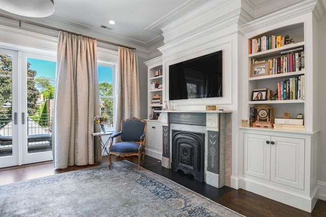 2123 N Bissell St, Chicago, IL 60614 - living area featuring crown molding, dark wood-type flooring, a premium fireplace, built in features, and recessed lighting