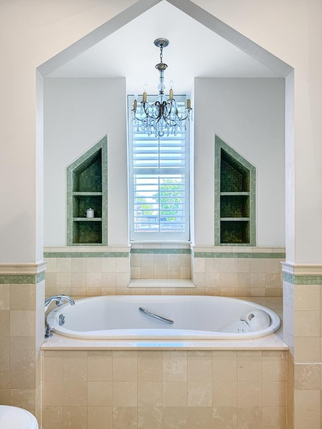 2123 N Bissell St, Chicago, IL 60614 - full bathroom featuring a chandelier and a bath