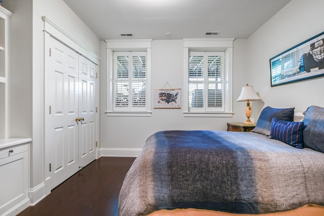 2123 N Bissell St, Chicago, IL 60614 - bedroom with dark wood finished floors and baseboards
