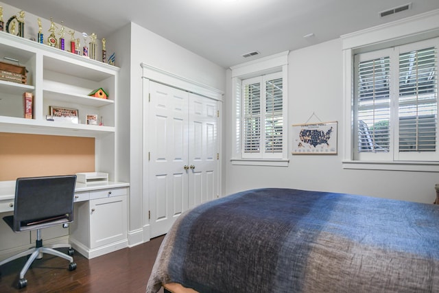 2123 N Bissell St, Chicago, IL 60614 - bedroom with dark wood-style floors and a closet