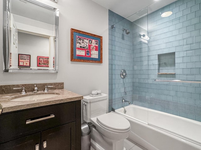 2123 N Bissell St, Chicago, IL 60614 - bathroom featuring vanity, washtub / shower combination, and toilet