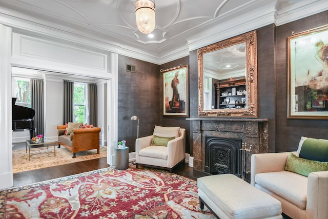 2123 N Bissell St, Chicago, IL 60614 - living area featuring wood finished floors, a high end fireplace, ornamental molding, and a chandelier