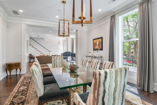 2123 N Bissell St, Chicago, IL 60614 - dining area featuring crown molding, dark wood-style floors, stairway, recessed lighting, and baseboards